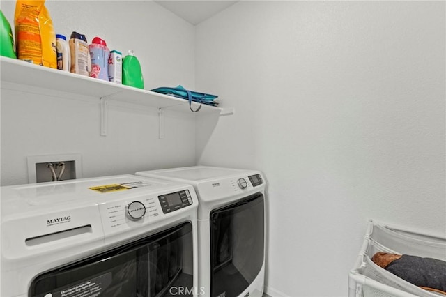 laundry room with laundry area and independent washer and dryer