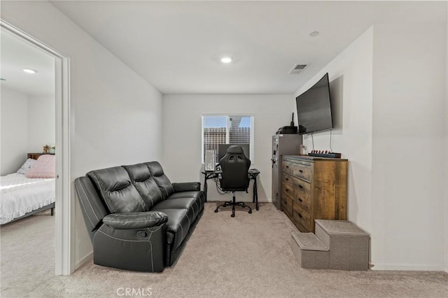 interior space with recessed lighting, visible vents, baseboards, and light colored carpet