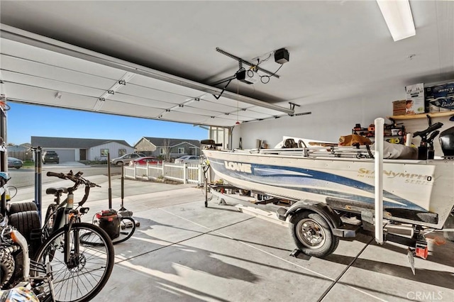 garage featuring a garage door opener