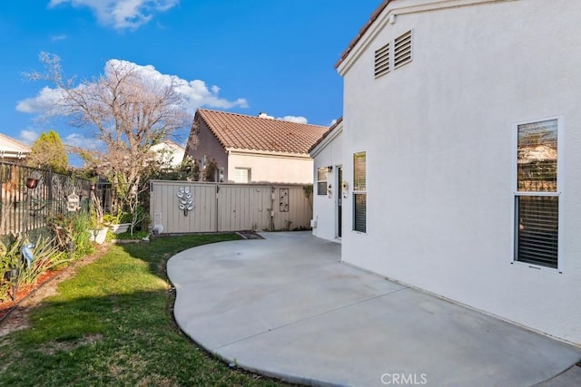 view of yard featuring a fenced backyard and a patio