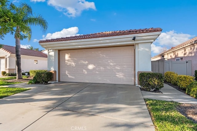 garage featuring fence