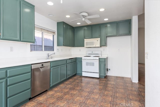 kitchen with ceiling fan, recessed lighting, white appliances, a sink, and light countertops