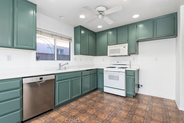 kitchen with recessed lighting, light countertops, a ceiling fan, a sink, and white appliances