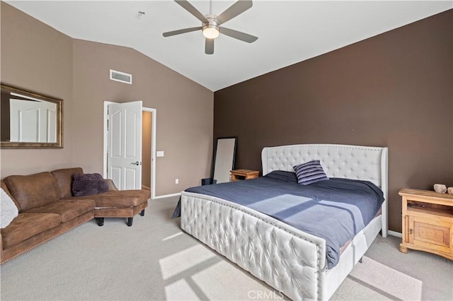 carpeted bedroom with ceiling fan, baseboards, visible vents, and vaulted ceiling