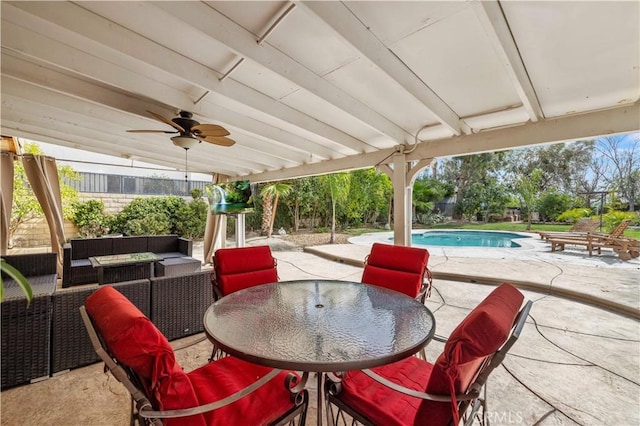 view of patio with an outdoor pool, outdoor dining area, ceiling fan, and an outdoor hangout area