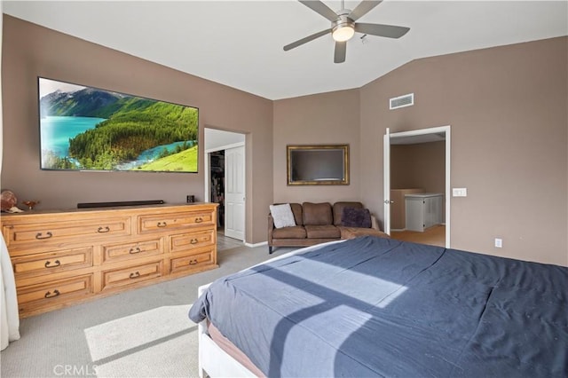 bedroom featuring light carpet, ceiling fan, visible vents, and vaulted ceiling