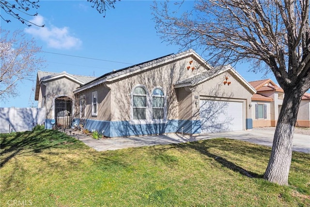 view of front of home with a front yard, driveway, an attached garage, and stucco siding