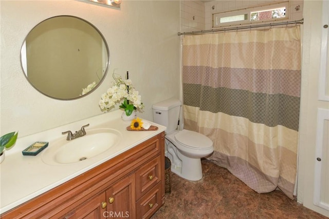 full bathroom with toilet, a shower with shower curtain, and vanity