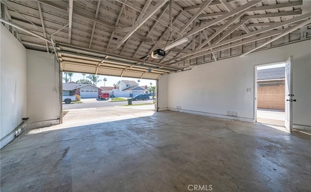 garage featuring a garage door opener