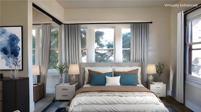 bedroom featuring wood finished floors