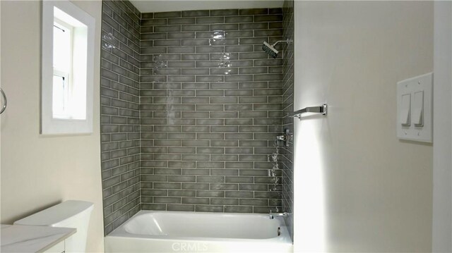 full bathroom featuring shower / bathtub combination and toilet