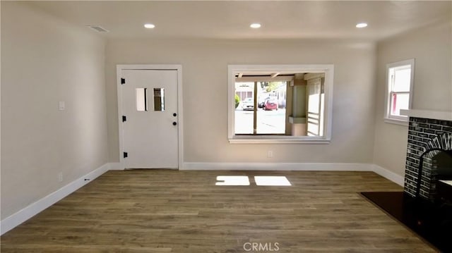 3688 Hoover St, Riverside, CA 92504 - entrance foyer featuring plenty of natural light, a fireplace, baseboards, wood finished floors, and recessed lighting