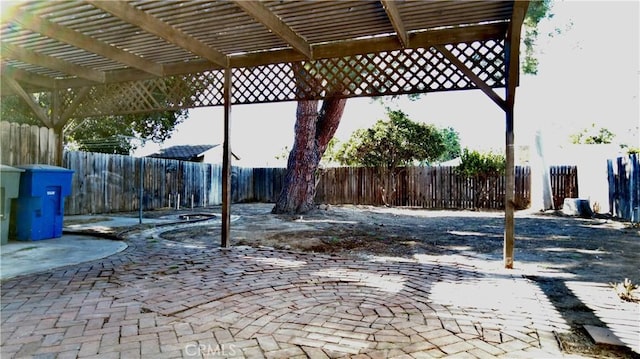 view of patio / terrace with fence and a pergola
