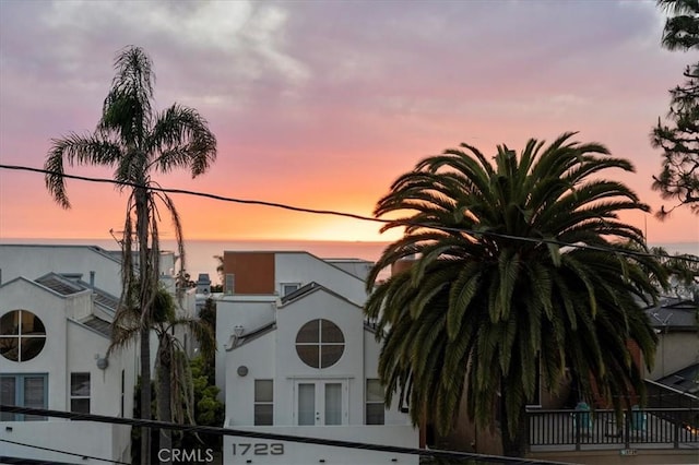 view of property at dusk