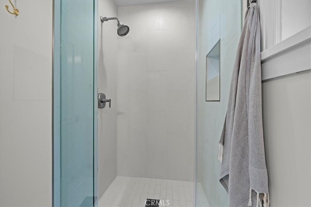 bathroom featuring a stall shower