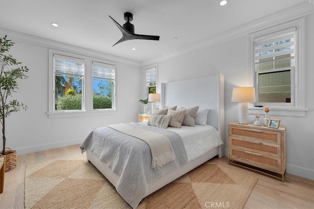 bedroom with baseboards, ornamental molding, wood finished floors, and recessed lighting