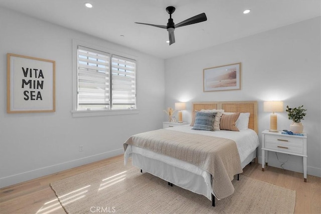 bedroom featuring ceiling fan, recessed lighting, wood finished floors, and baseboards