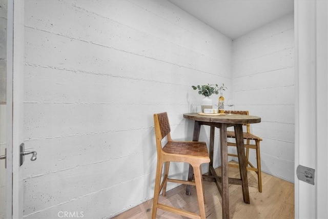 dining space featuring light wood-style floors