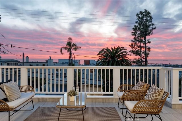 view of balcony at dusk