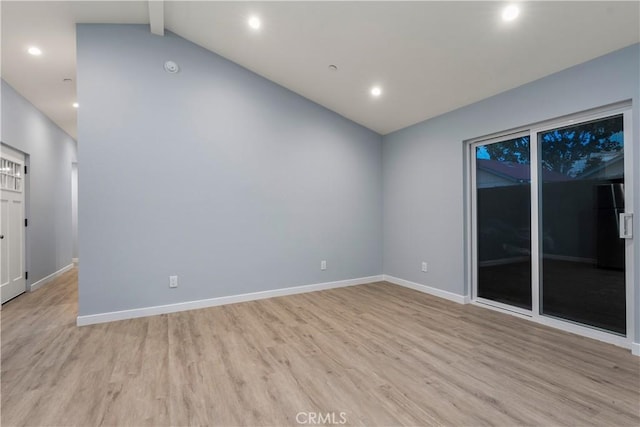 empty room with lofted ceiling with beams, recessed lighting, light wood-style flooring, and baseboards