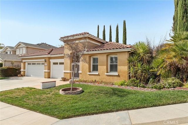 mediterranean / spanish home with a garage, concrete driveway, a tiled roof, a front lawn, and stucco siding