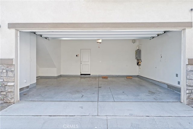 garage with baseboards