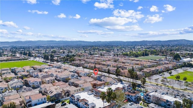 birds eye view of property featuring a residential view and a mountain view