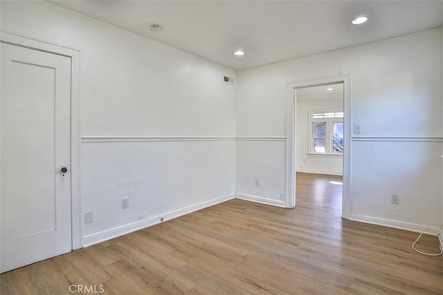 3255 N Arrowhead Ave, San Bernardino, CA 92405 - spare room featuring baseboards, recessed lighting, and wood finished floors