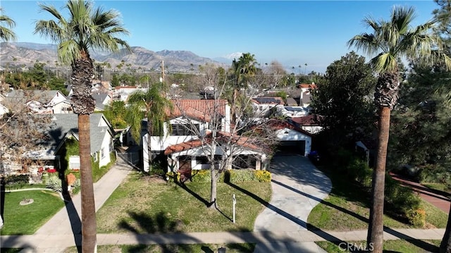 exterior space featuring a residential view and a mountain view