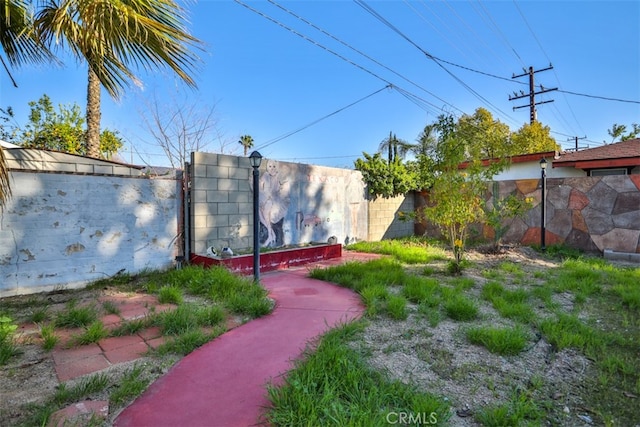 view of yard featuring fence