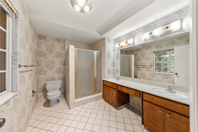 full bath with wallpapered walls, toilet, a stall shower, a sink, and tile patterned floors