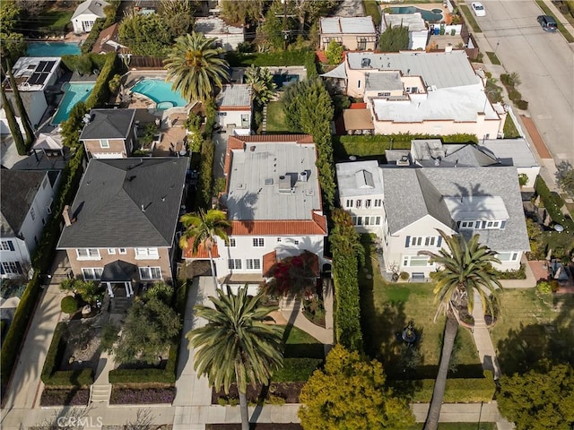 birds eye view of property with a residential view