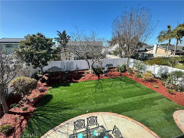 view of yard featuring a fenced backyard