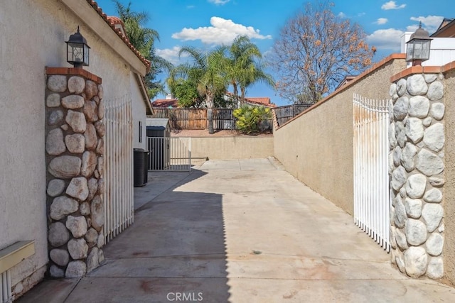 view of patio / terrace featuring fence