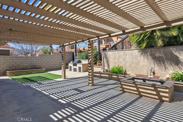 view of patio with fence and a pergola