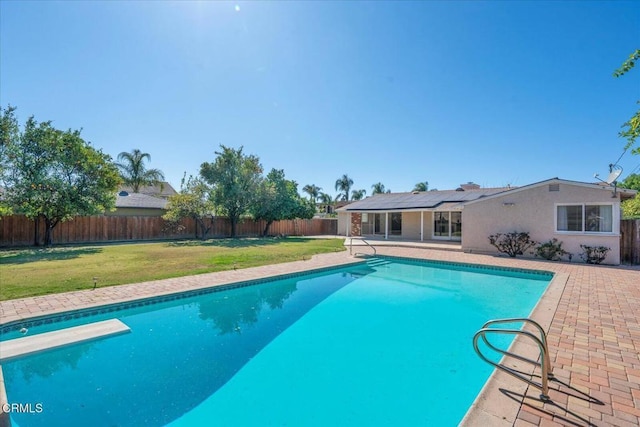 view of pool featuring a yard, a patio, a fenced backyard, and a fenced in pool