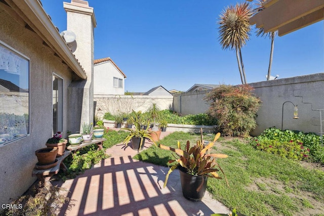 view of patio with a fenced backyard