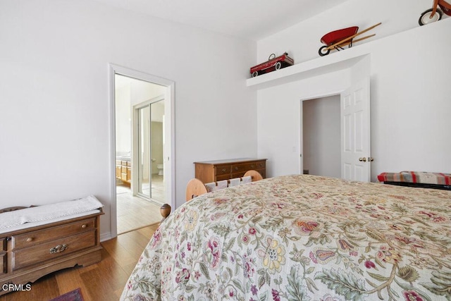 bedroom with wood finished floors