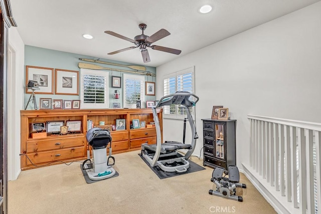 exercise area featuring recessed lighting, carpet flooring, and ceiling fan