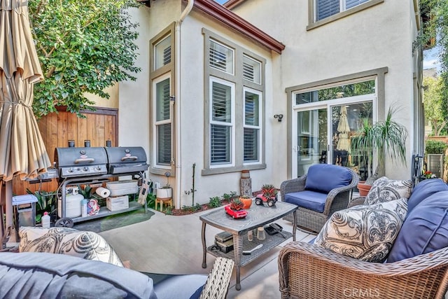 view of patio with fence and an outdoor living space