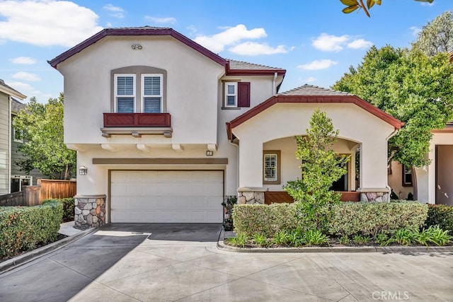 5 Ash Hollow Trl, Ladera Ranch, CA 92694 - mediterranean / spanish-style home with a garage, stucco siding, and concrete driveway