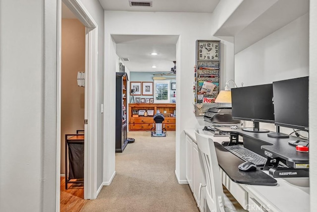 office featuring ceiling fan, recessed lighting, visible vents, and light colored carpet