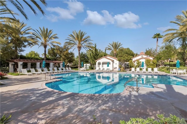 community pool featuring a patio