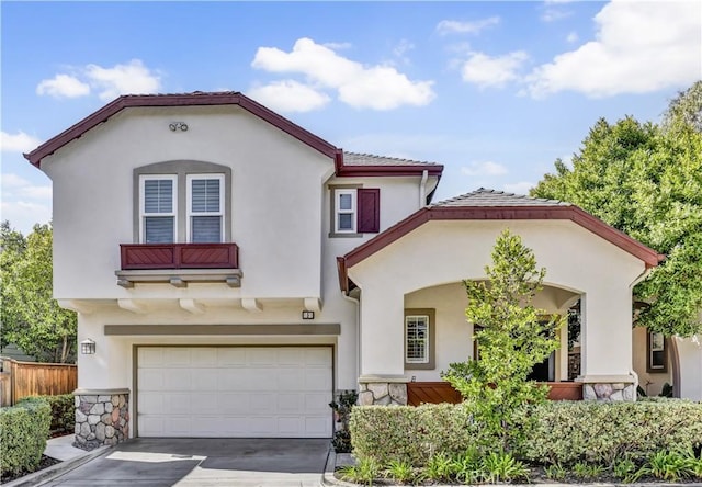 5 Ash Hollow Trl, Ladera Ranch, CA 92694 - mediterranean / spanish house featuring a garage, stucco siding, concrete driveway, and stone siding