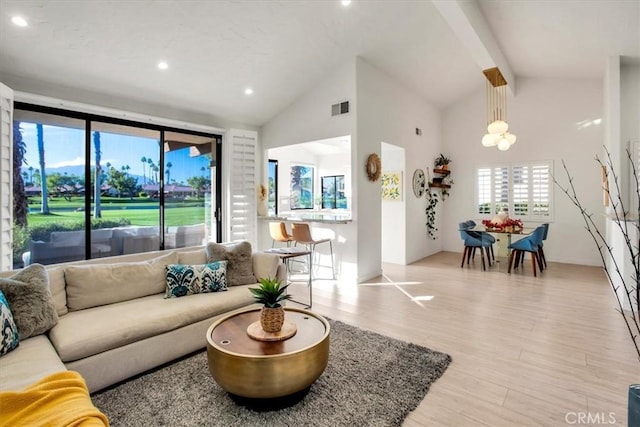 living room with high vaulted ceiling, recessed lighting, wood finished floors, visible vents, and beamed ceiling