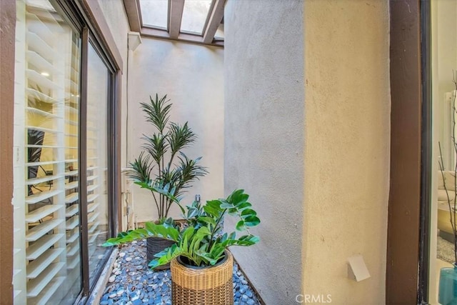 31 Blue River Dr, Palm Desert, CA 92211 - doorway to property featuring stucco siding