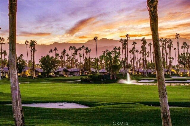 31 Blue River Dr, Palm Desert, CA 92211 - view of community with a mountain view, a lawn, and golf course view