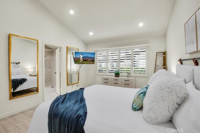 31 Blue River Dr, Palm Desert, CA 92211 - bedroom featuring lofted ceiling, recessed lighting, wood finished floors, and ensuite bath