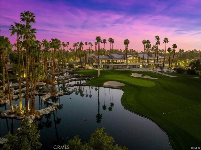 31 Blue River Dr, Palm Desert, CA 92211 - view of home's community featuring an area to practice putting, a water view, and view of golf course