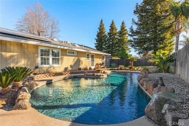 view of pool with a fenced backyard and a fenced in pool